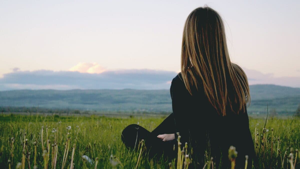 Girl looking at the mountains