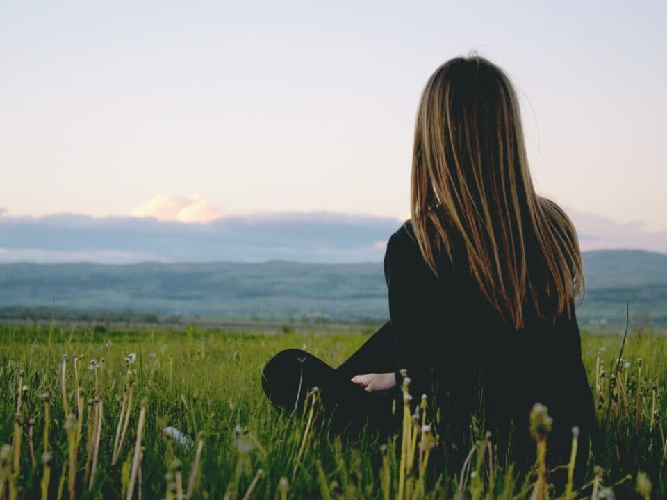 Girl looking at the mountains