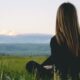 Girl looking at the mountains