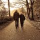 elderly couple walking on the street