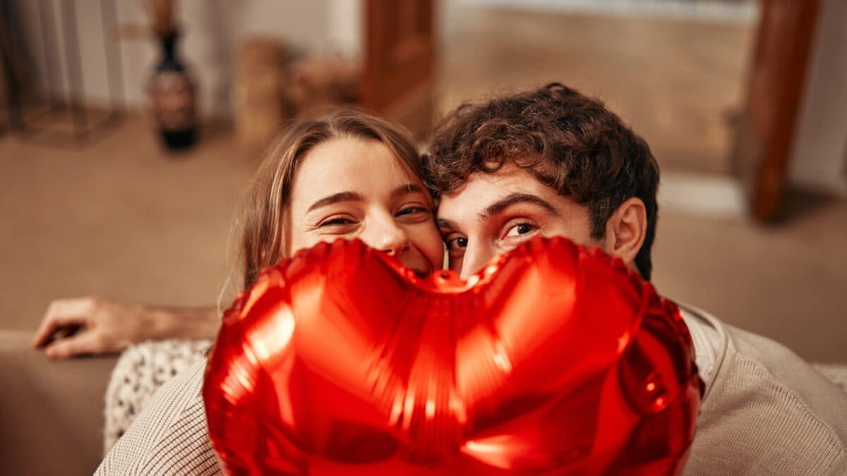 couple with heart balloon