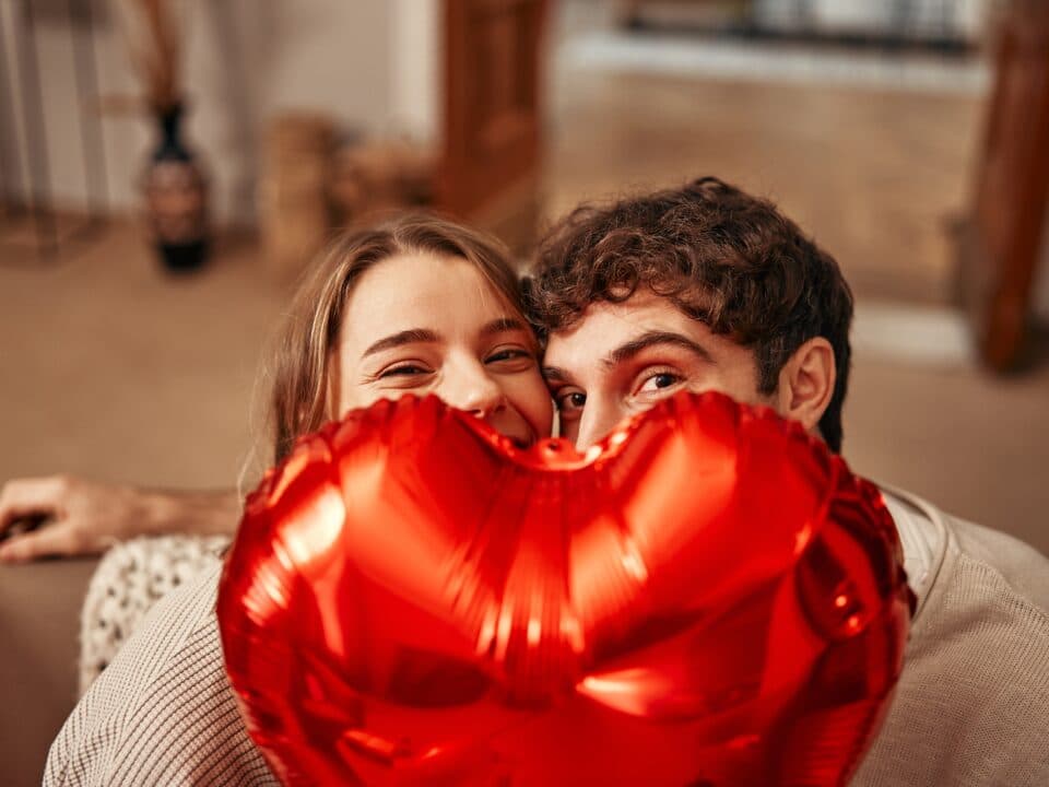 couple with heart balloon